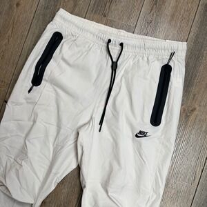 Nike Sportswear Tech Woven Pants Mens Size Large Light Orewood HM8241-104 NWT